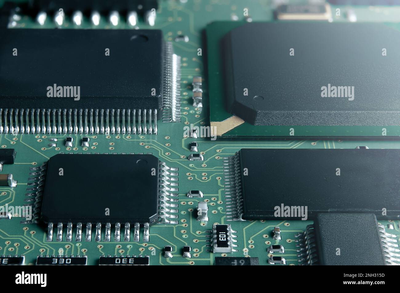 Closeup of Printed Circuit Board with processor, integrated circuits