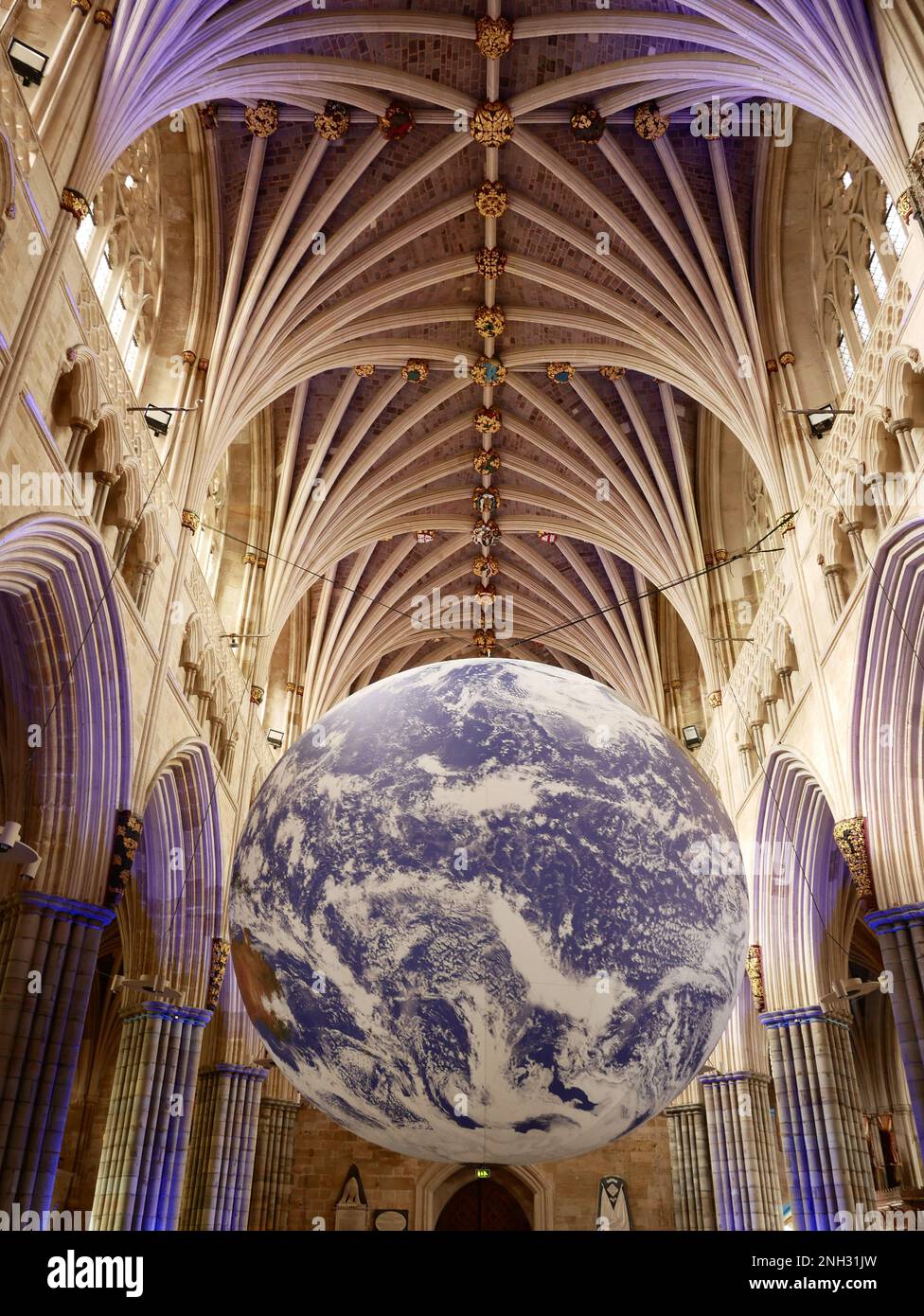 Gaia, a touring artwork by artist Luke Jerram, presented in Exeter Cathedral, Exeter, Devon UK Stock Photo