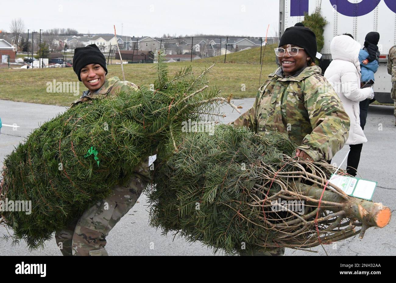 Fort Drum community members receive their free Christmas trees Dec. 9