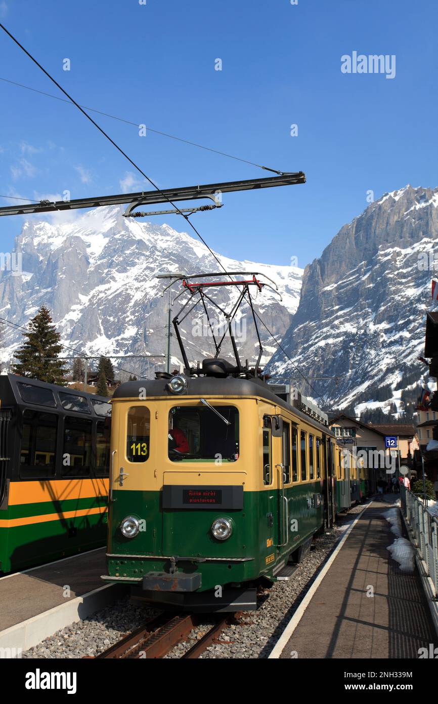 Swiss trains in the station at the ski resort of Grindelwald, Swiss Alps, Jungfrau - Aletsch; Bernese Oberland; Switzerland; Europe Stock Photo