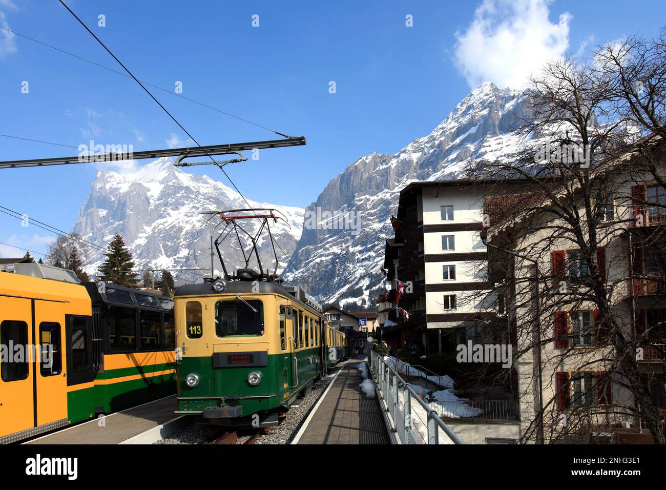 Swiss trains in the station at the ski resort of Grindelwald, Swiss Alps, Jungfrau - Aletsch; Bernese Oberland; Switzerland; Europe Stock Photo