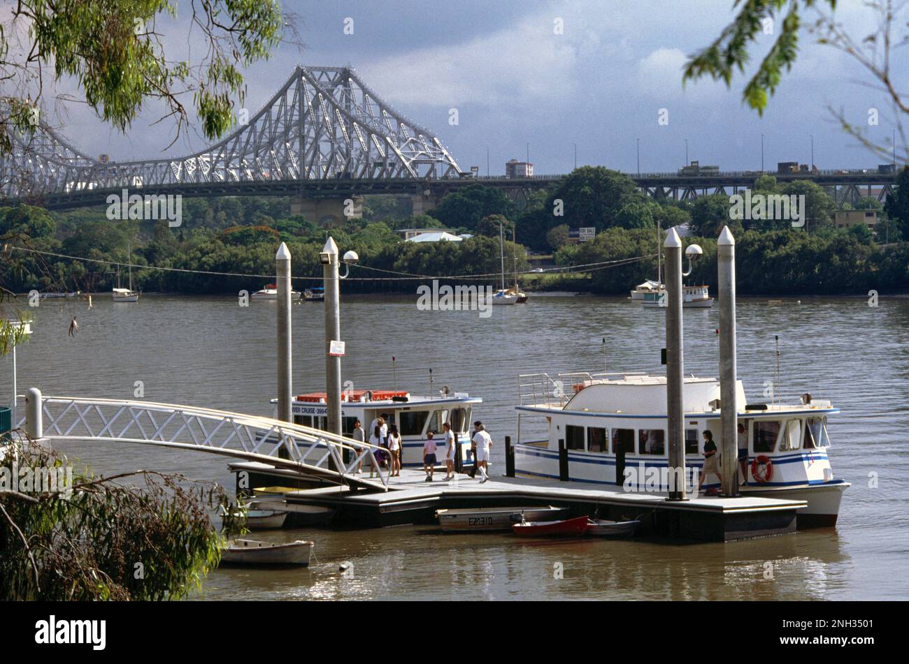 Brisbane Australia Ferry Boats Docked Story Bridge over Brisbane River Stock Photo