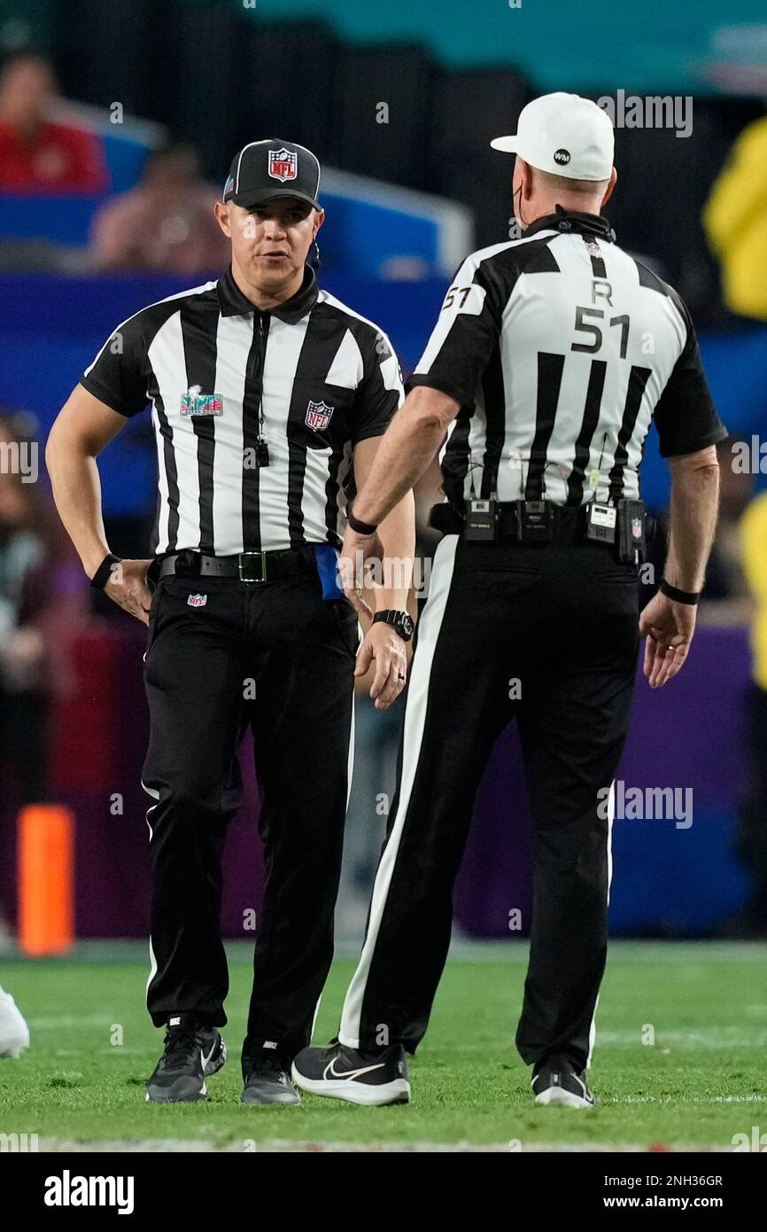 Down judge Jerod Phillips (6) speaks with referee Carl Cheffers (51) during  the NFL Super Bowl 57 football game, Sunday, Feb. 12, 2023, in Glendale,  Ariz. The Kansas City Chiefs defeated the