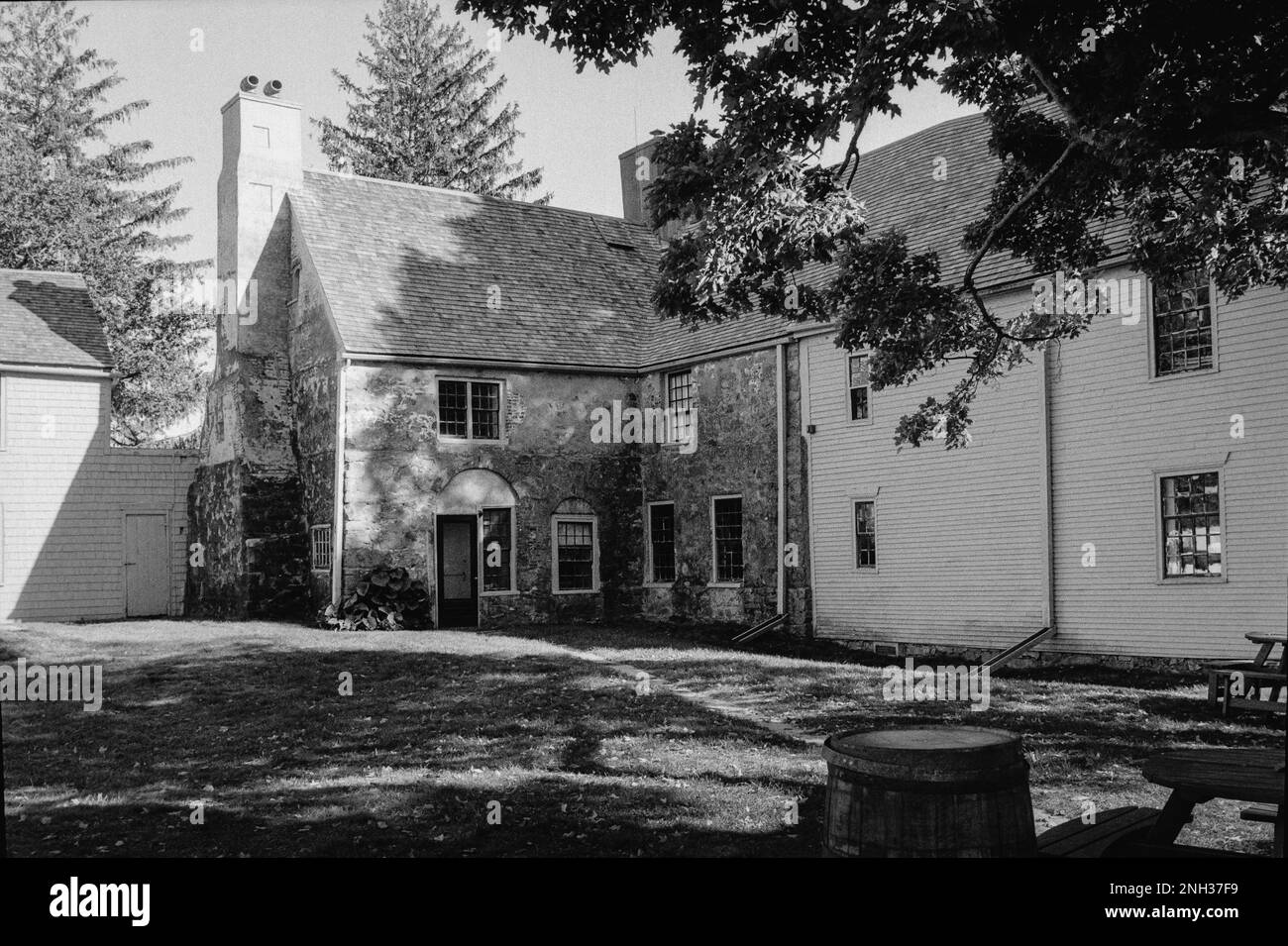 The backside of Spencer-Peirce-Little farm home. The image was captured on analog black and white film. Newbury, Massachusetts USA. Stock Photo