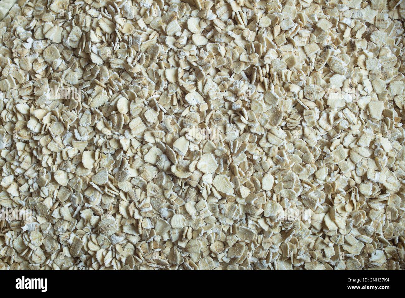 Top view close-up of premium whole grain oats, showcasing their texture and beauty. Perfect for healthy living promotion. Organic texture abstract bac Stock Photo