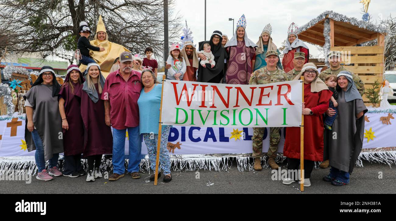 Leaders from the Mobilization Support Brigade and the 120th Infantry Brigade pose with the Division I winners of the float competition for the Gatesville Chamber of Commers' annual Christmas parade held December 10, 2022 in Gatesville, Texas. The U.S. Army leaders were invited to judge floats for the Gatesville Chamber of Commerce annual Christmas parade, as part of a community relations event. Stock Photo