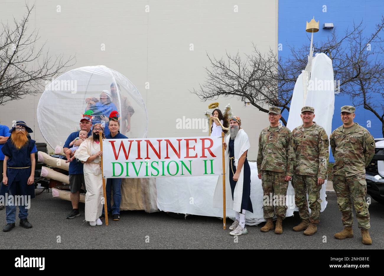 Leaders from the Mobilization Support Brigade and the 120th Infantry Brigade pose with the Division II winners of the float competition for the Gatesville Chamber of Commers' annual Christmas parade held December 10, 2022 in Gatesville, Texas. The U.S. Army leaders were invited to judge floats for the Gatesville Chamber of Commerce annual Christmas parade, as part of a community relations event. Stock Photo