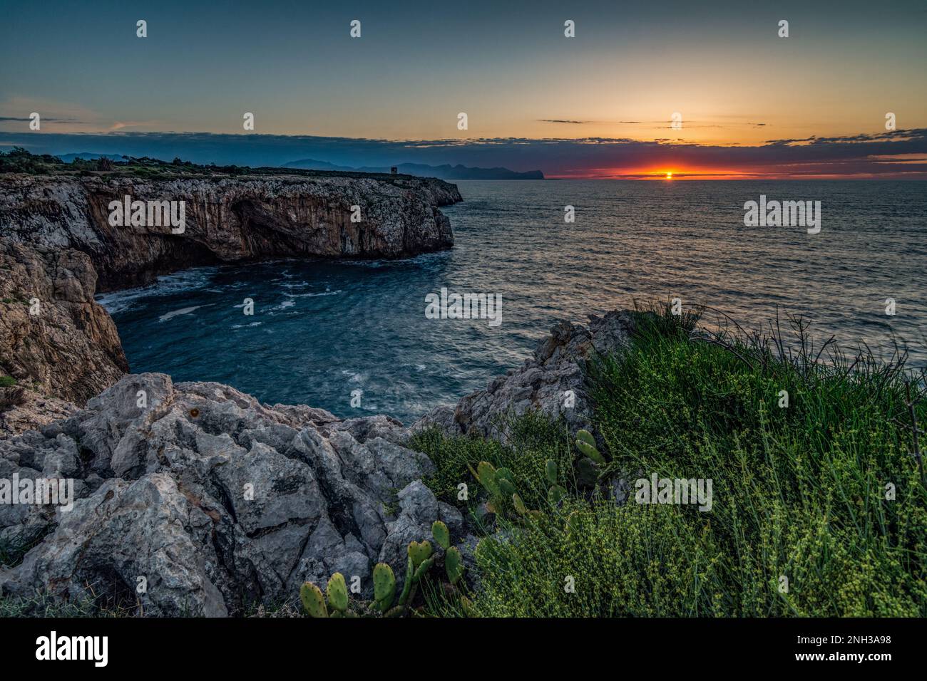 Panoramic view of the Sicilian coasts at dusk from Capo Rama, Terrasini Stock Photo