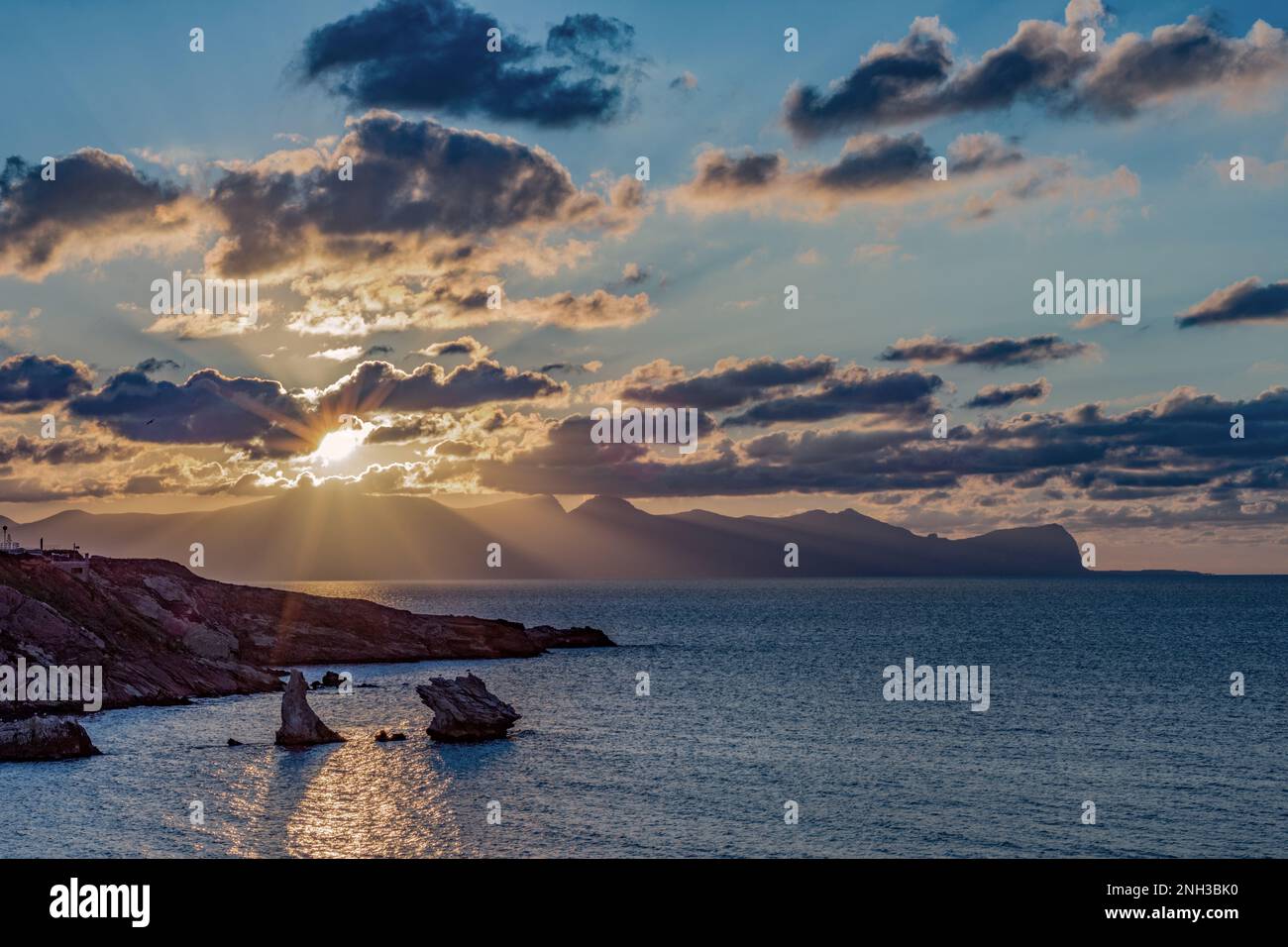 View of the Sicilian coasts and Terrasini stacks at dusk Stock Photo