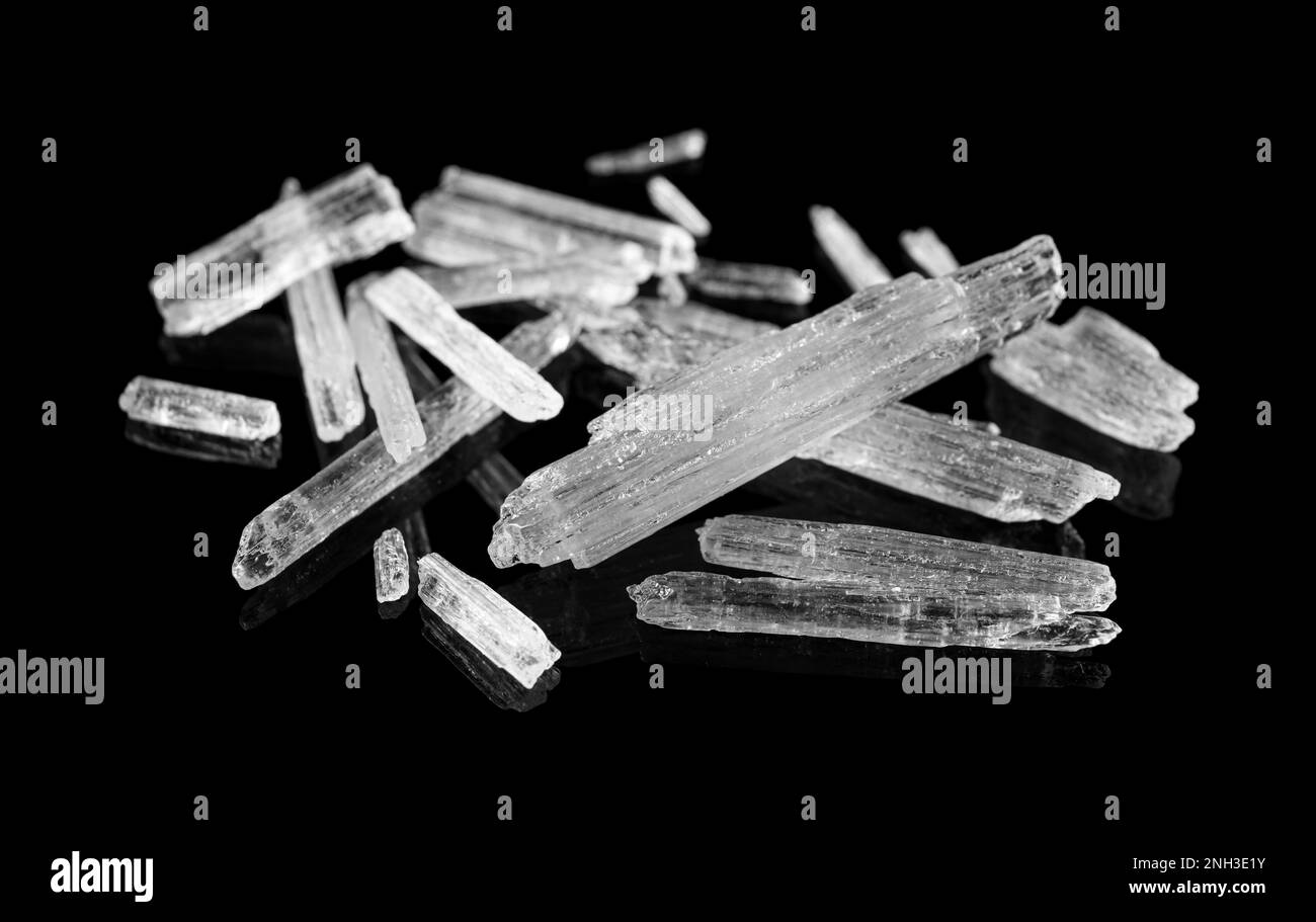 Menthol crystals on black background, closeup view Stock Photo - Alamy