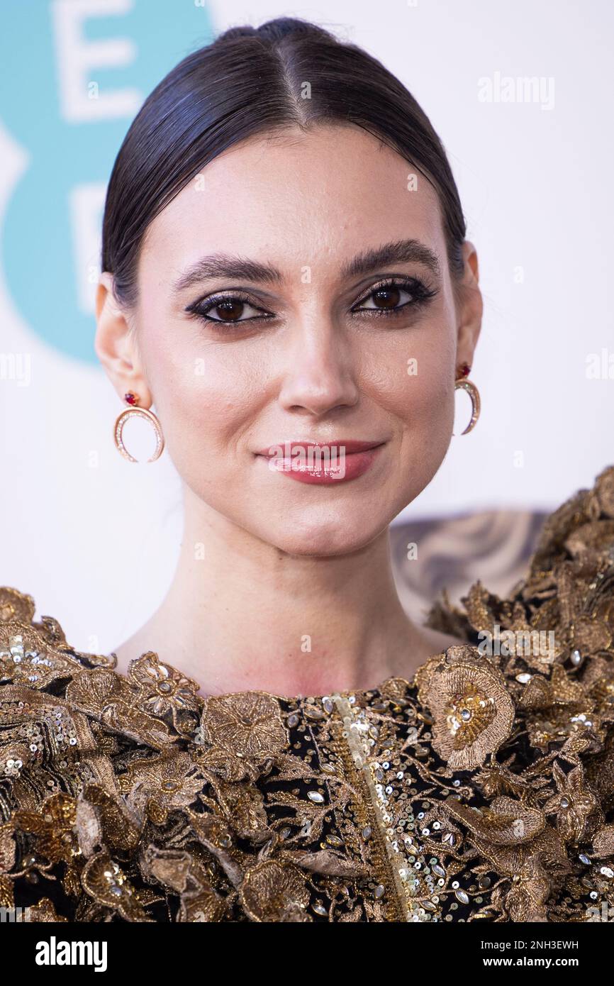 Andreea Cristea poses for photographers upon arrival at the 76th