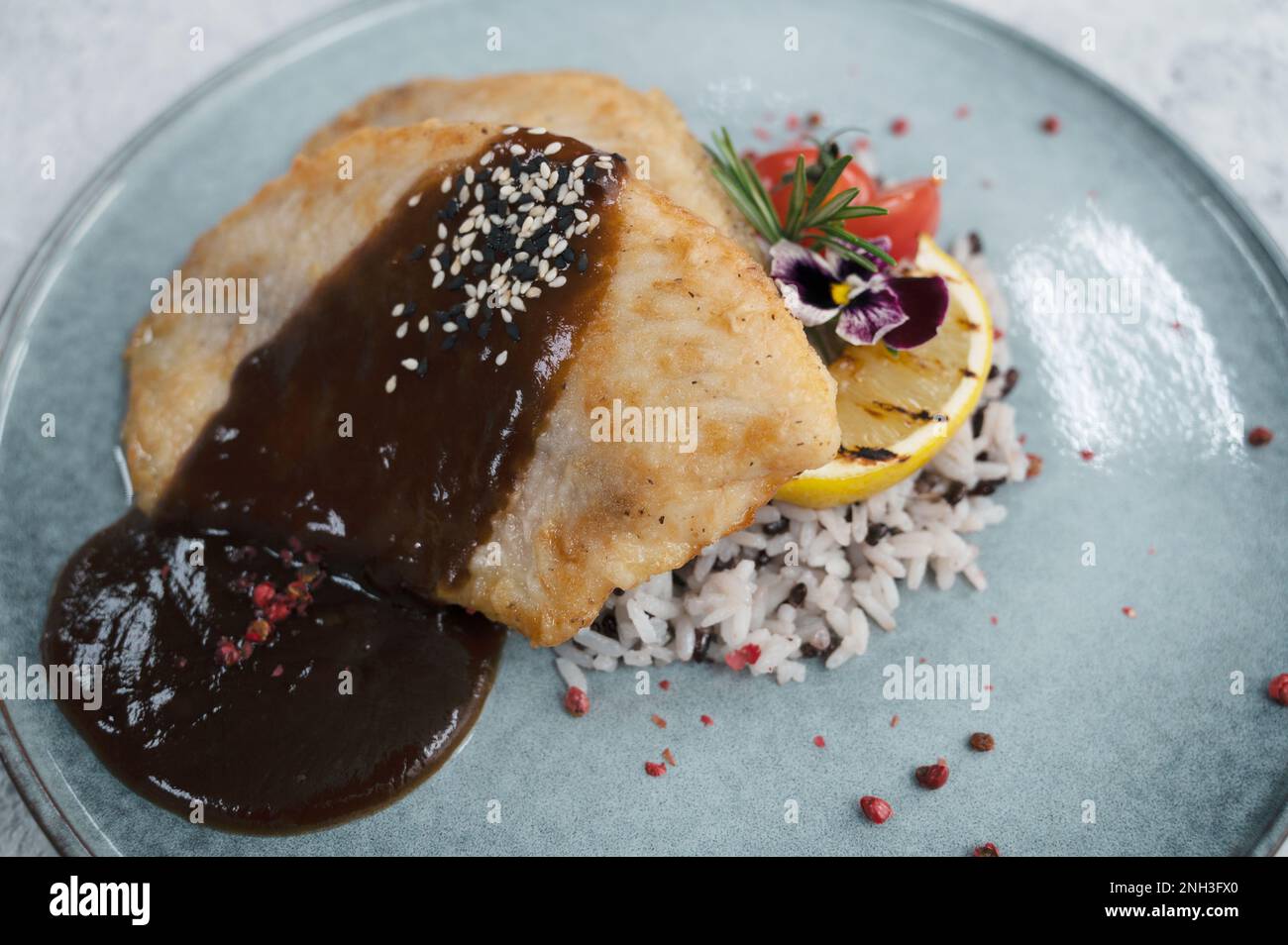 Fried tilapia fish with rice sauce and vegetable Stock Photo Alamy