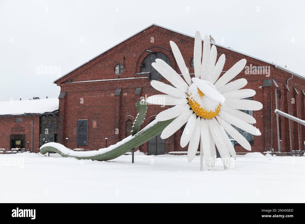 Turku, Finland - January 17, 2016: Giant chamomile flower installation in front of Forum Marinum Stock Photo