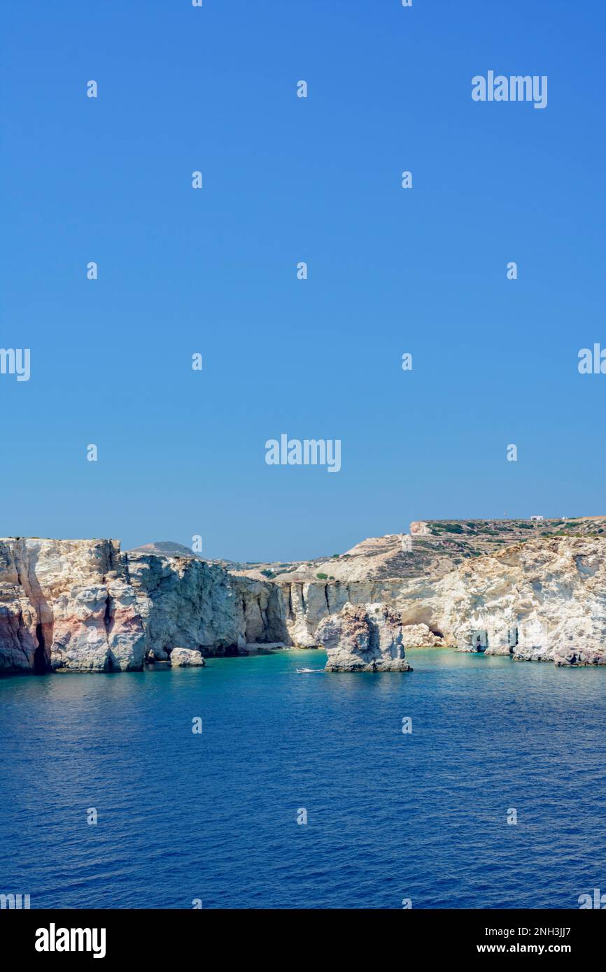 The colorful cliffs of Kimolos island, Greece Stock Photo