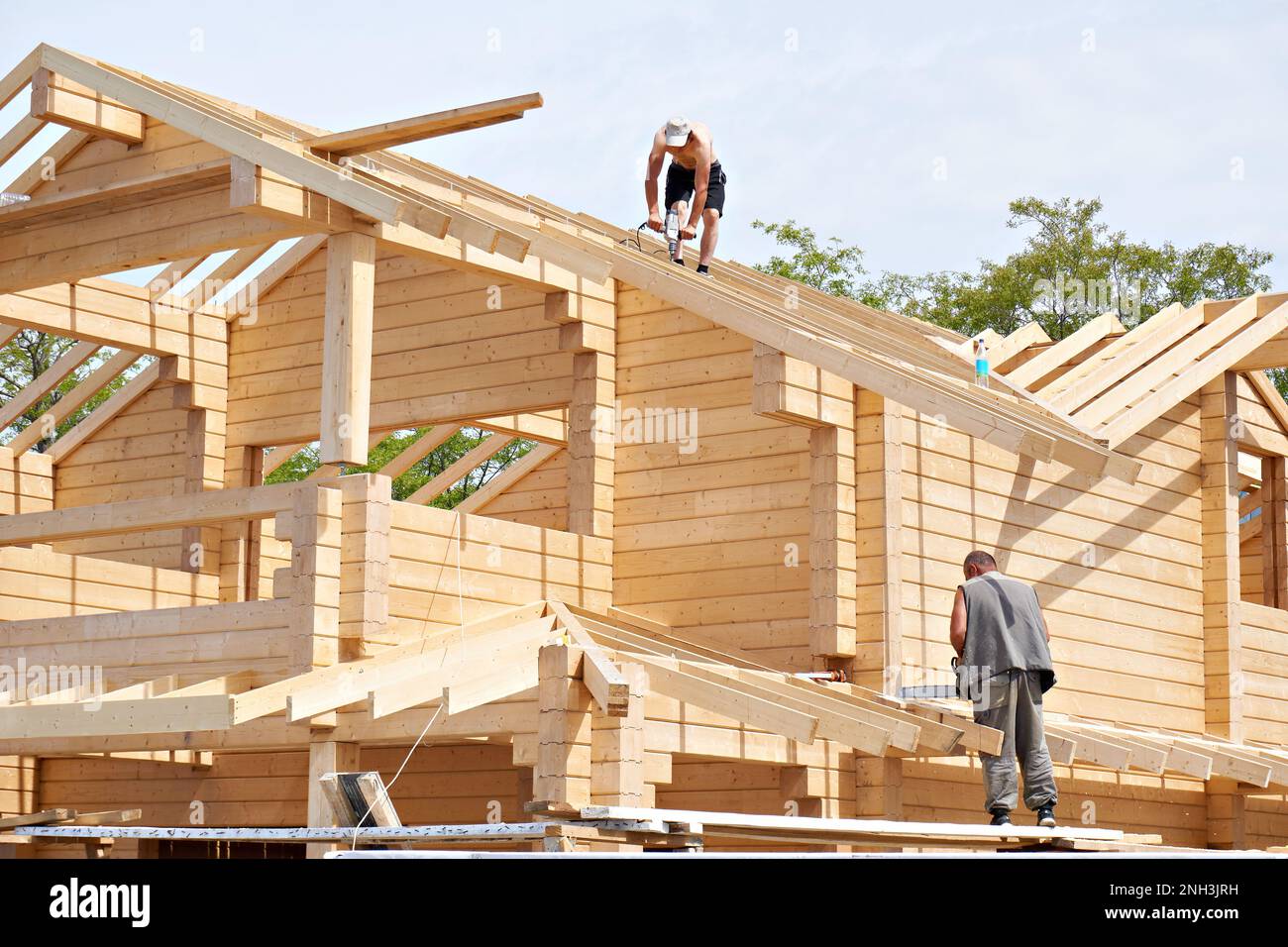 Construction workers build house hires stock photography and images