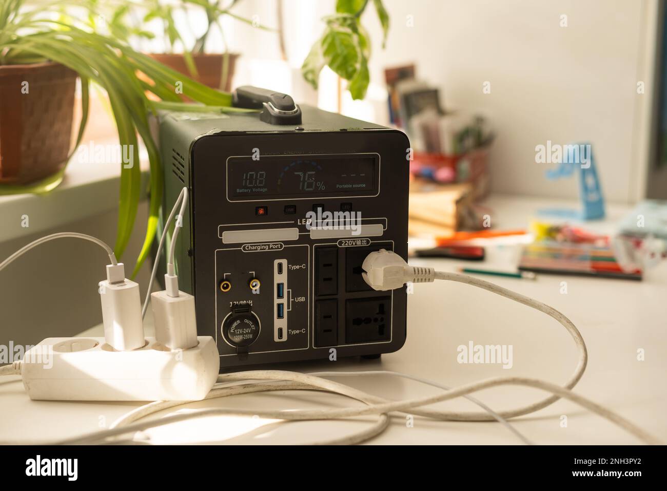 portable charging station charges gadgets Stock Photo