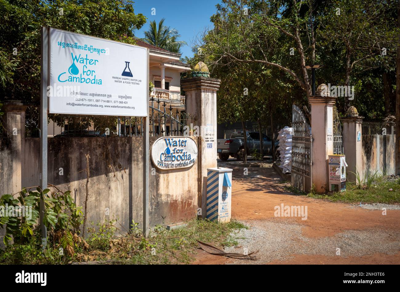 The entrance to the offices, laboratory and workshop for non-governmental charity organisation Water for Cambodia in Siem Reap, Cambodia. Stock Photo