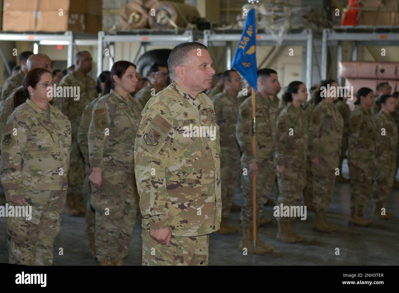 Puerto Rico Command Post U.S. Airmen with the Puerto Rico Air National Guard stand at attention ...
