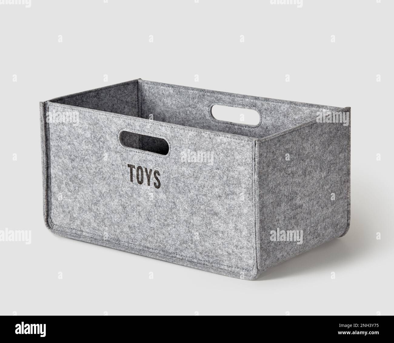 Handcrafted gray felt box with handles for storing toys Stock Photo Alamy