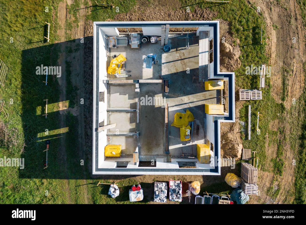 Top down aerial view of a family home under construction Stock Photo