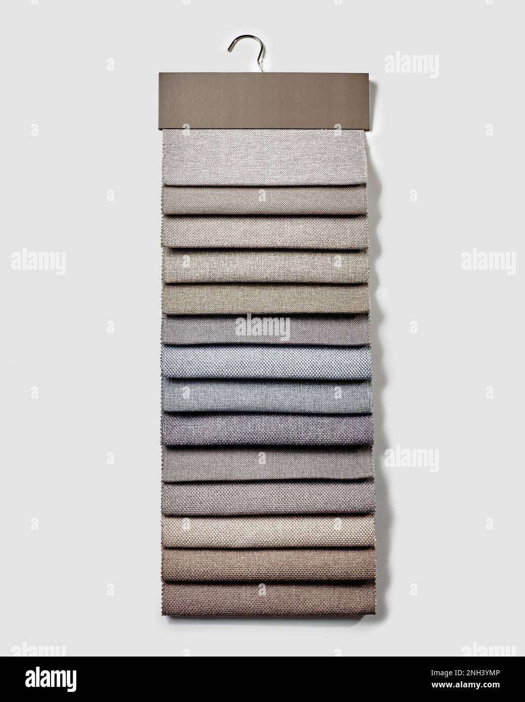 Collection of natural upholstery fabric samples for furniture design