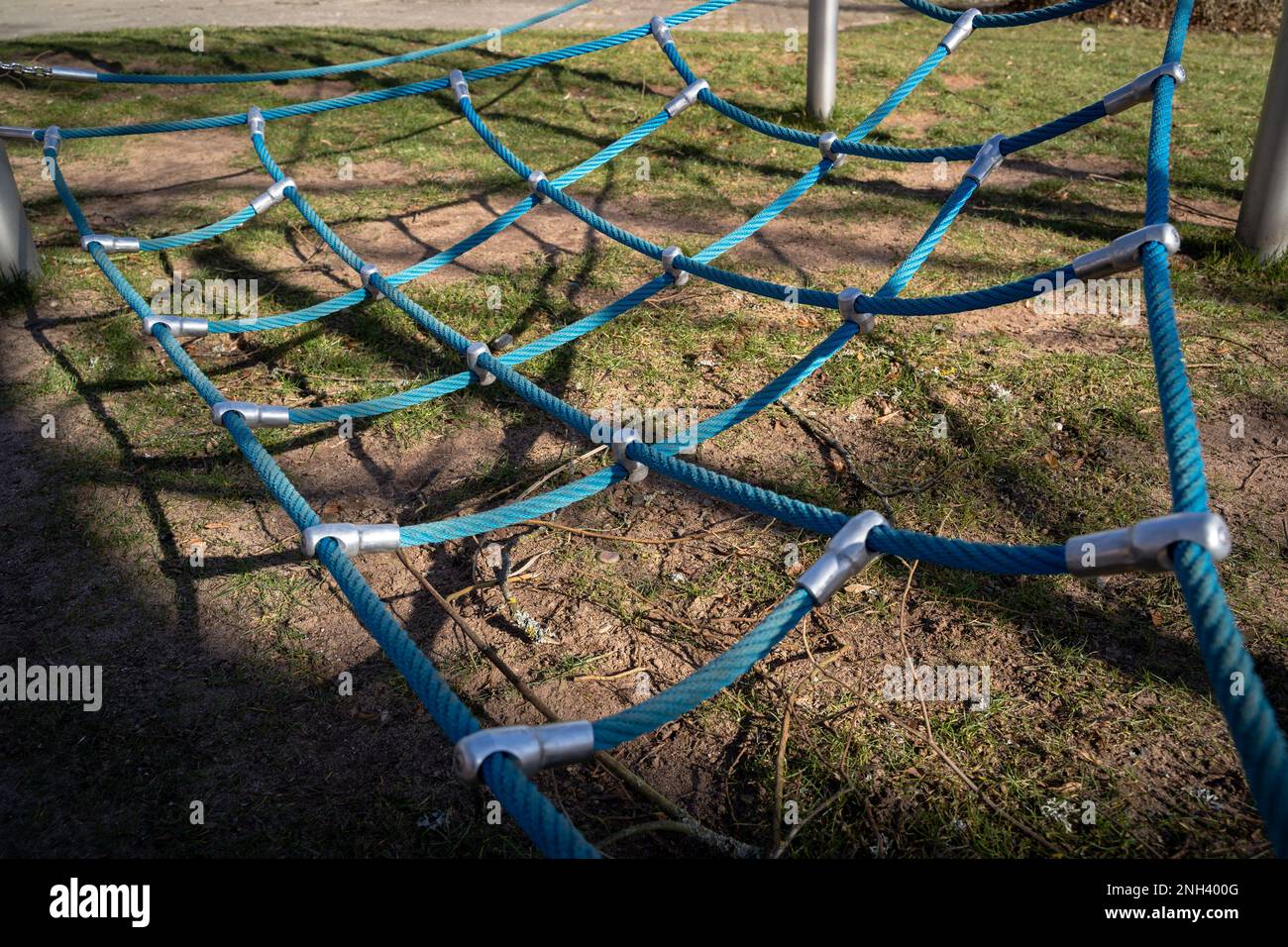 Blue climbing net for children in the playground Stock Photo - Alamy