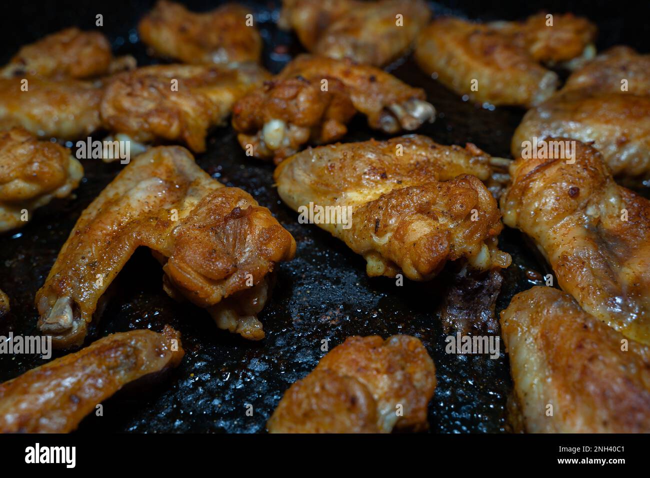 Crispy grilled chicken wings on a baking sheet Stock Photo Alamy