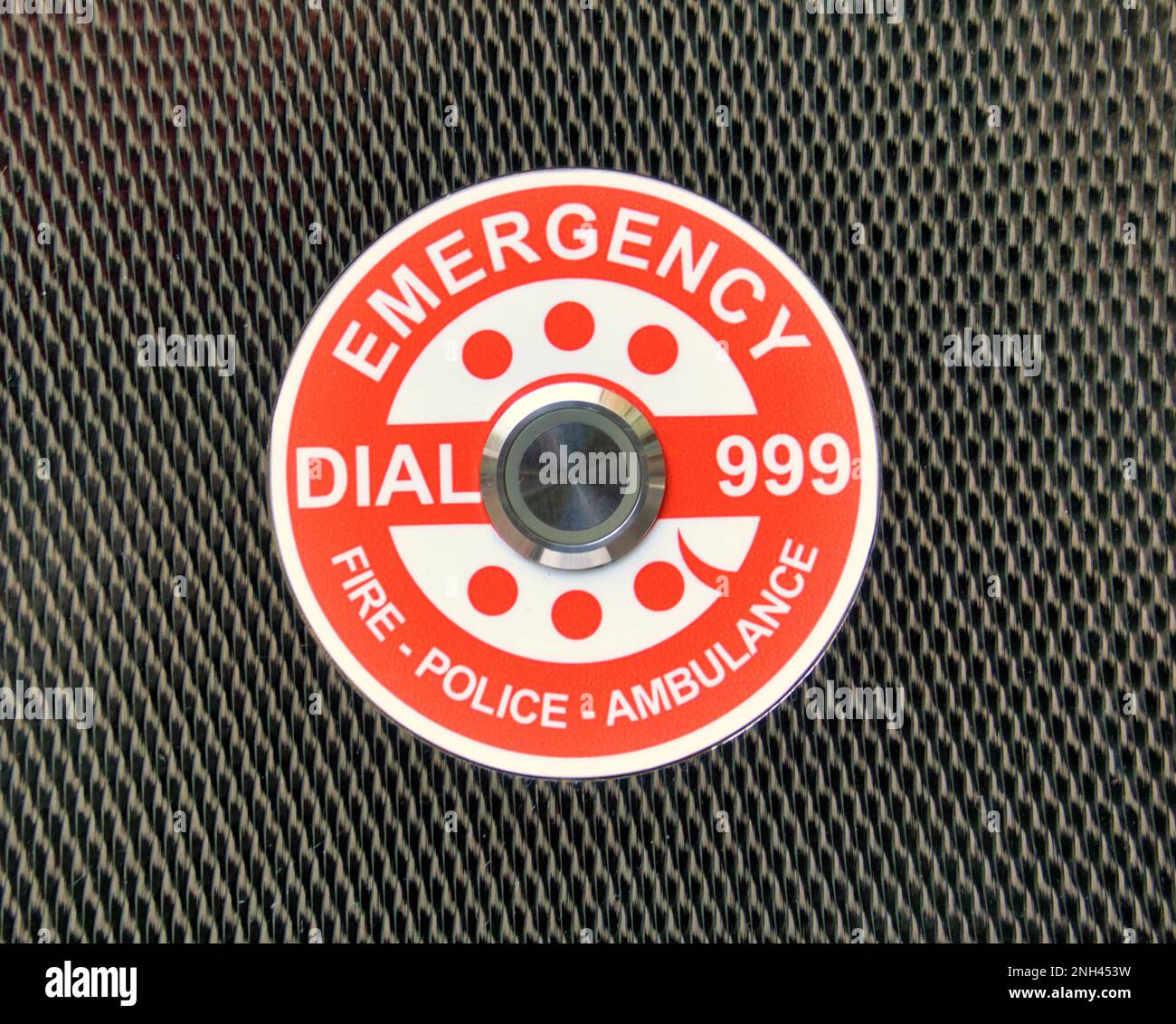 emergency dial 999 fire police ambulance button  on a defibrillator Stock Photo