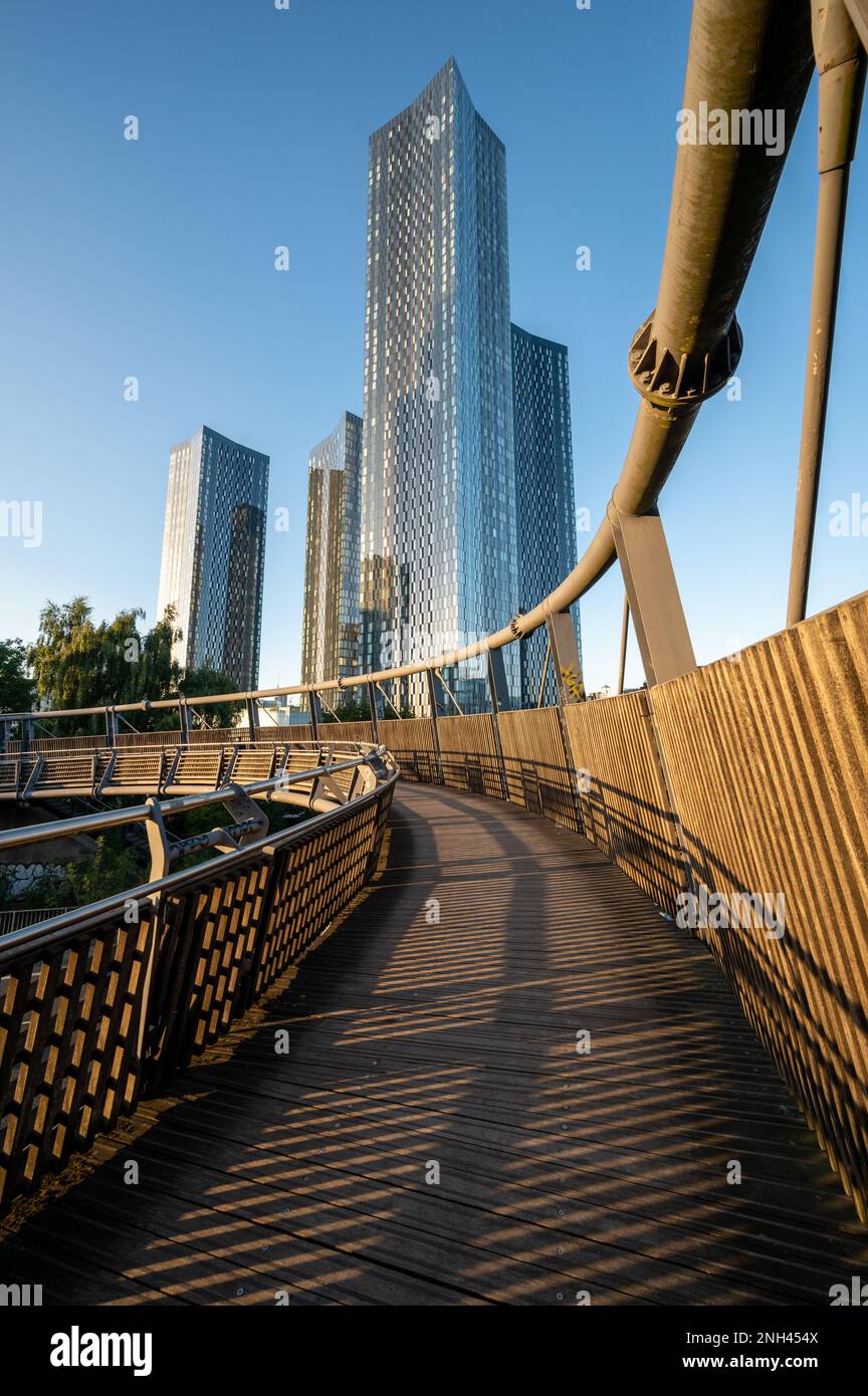 Low angle view of Mancunian Footbridge over the Mancunian Way near Hulme, Manchester. Stock Photo