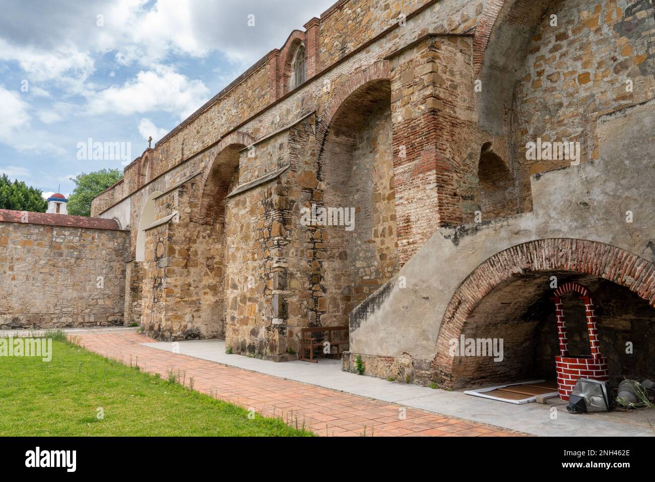 Stone buttresses of the parish church of San Bartolo Coyotepec in the Central Valleys of Oaxaca, Mexico. Stock Photo