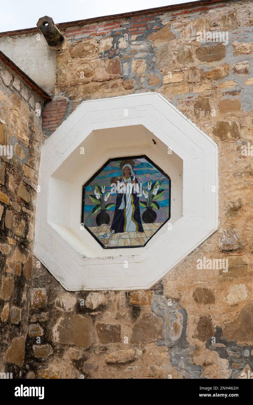 Octagonal stained glass window in the parish church of San Bartolo Coyotepec in the Central Valleys of Oaxaca, Mexico. Stock Photo