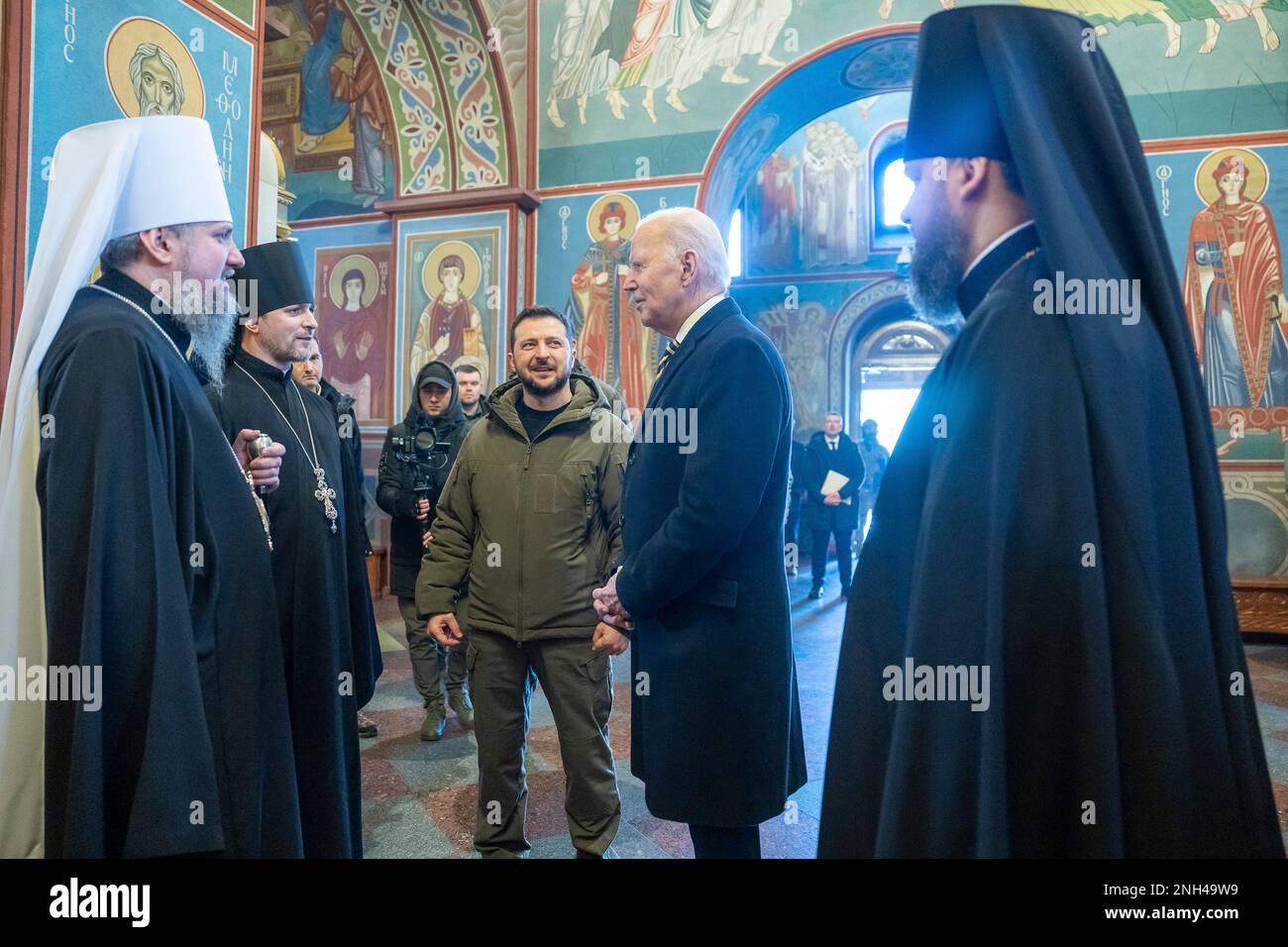 Kyiv, Ukraine. 20th Feb, 2023. U.S. President Joe Biden, right, accompanied by Ukrainian President Volodymyr Zelenskyy, center, chats with Christian Orthodox priests during a visit to the St. Michaels Golden-Domed Cathedral, February 20, 2023 in Kyiv, Ukraine. Biden stopped in Kiev on an unannounced visit to renew American support for Ukraine. Credit: Adam Schultz/White House Photo/Alamy Live News Stock Photo