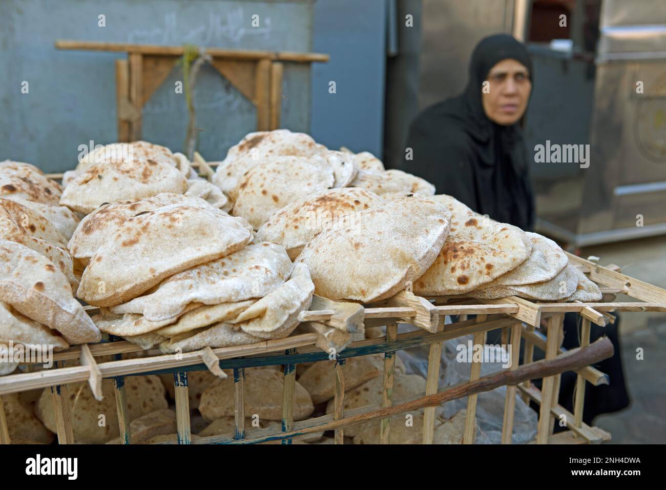 Selling pita bread in the Old City, Cairo, Egypt Stock Photo Alamy