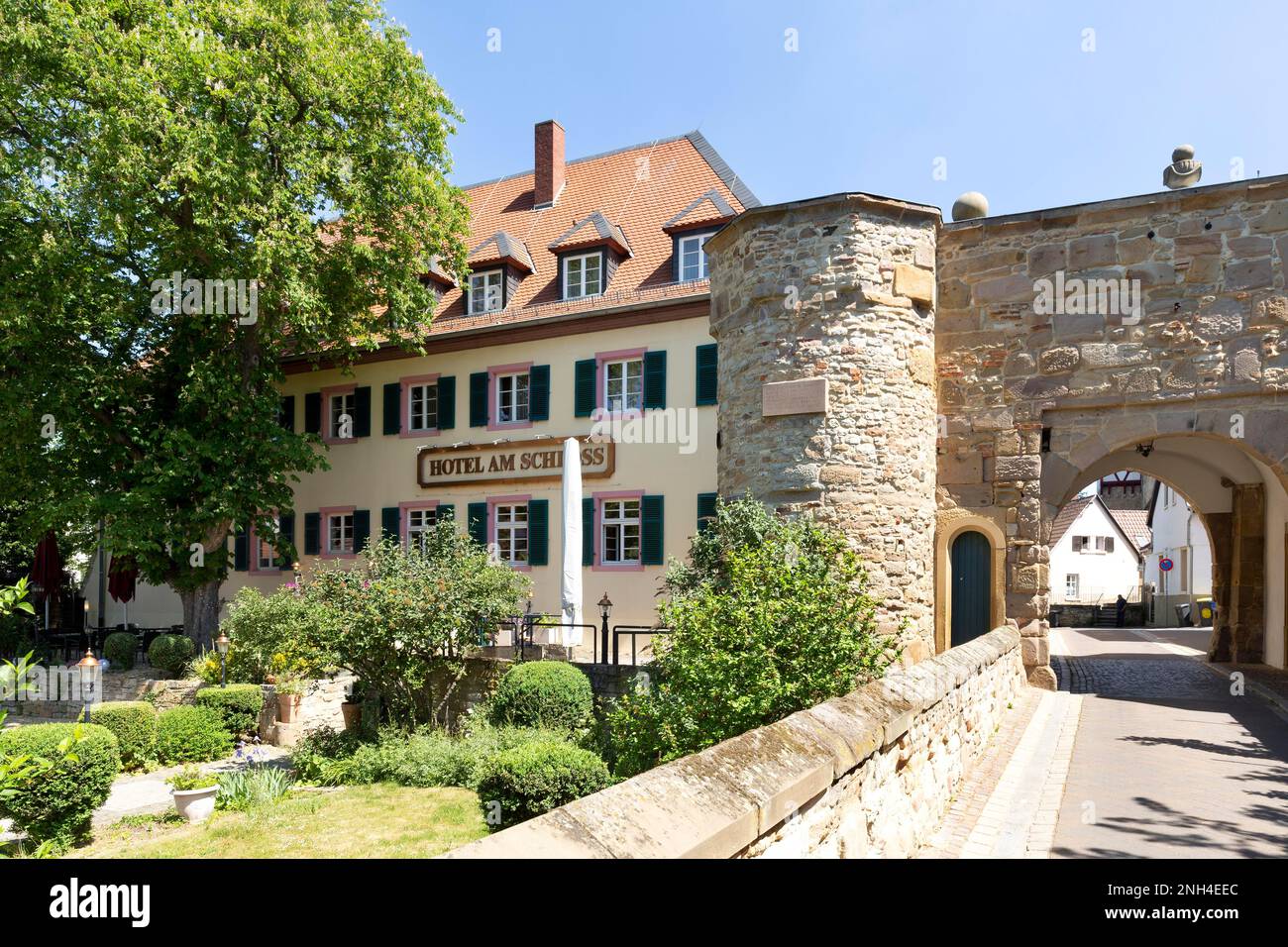 Archway of the medieval town fortifications on Schlossgasse and former cellar of the Electoral Palatinate High Office, today Hotel am Schloss, Alzey Stock Photo