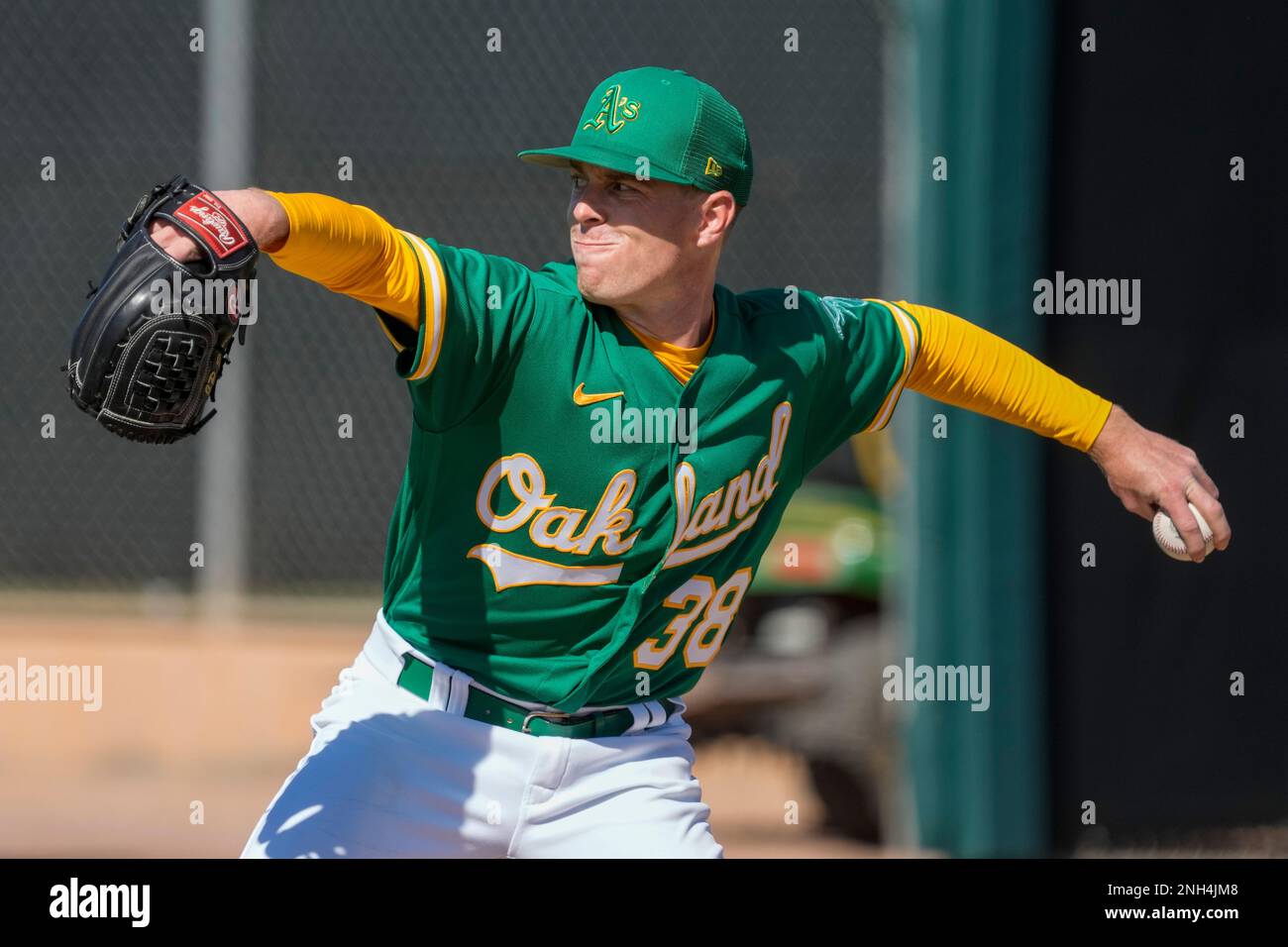 oakland-athletics-jp-sears-throws-during-a-spring-training-baseball