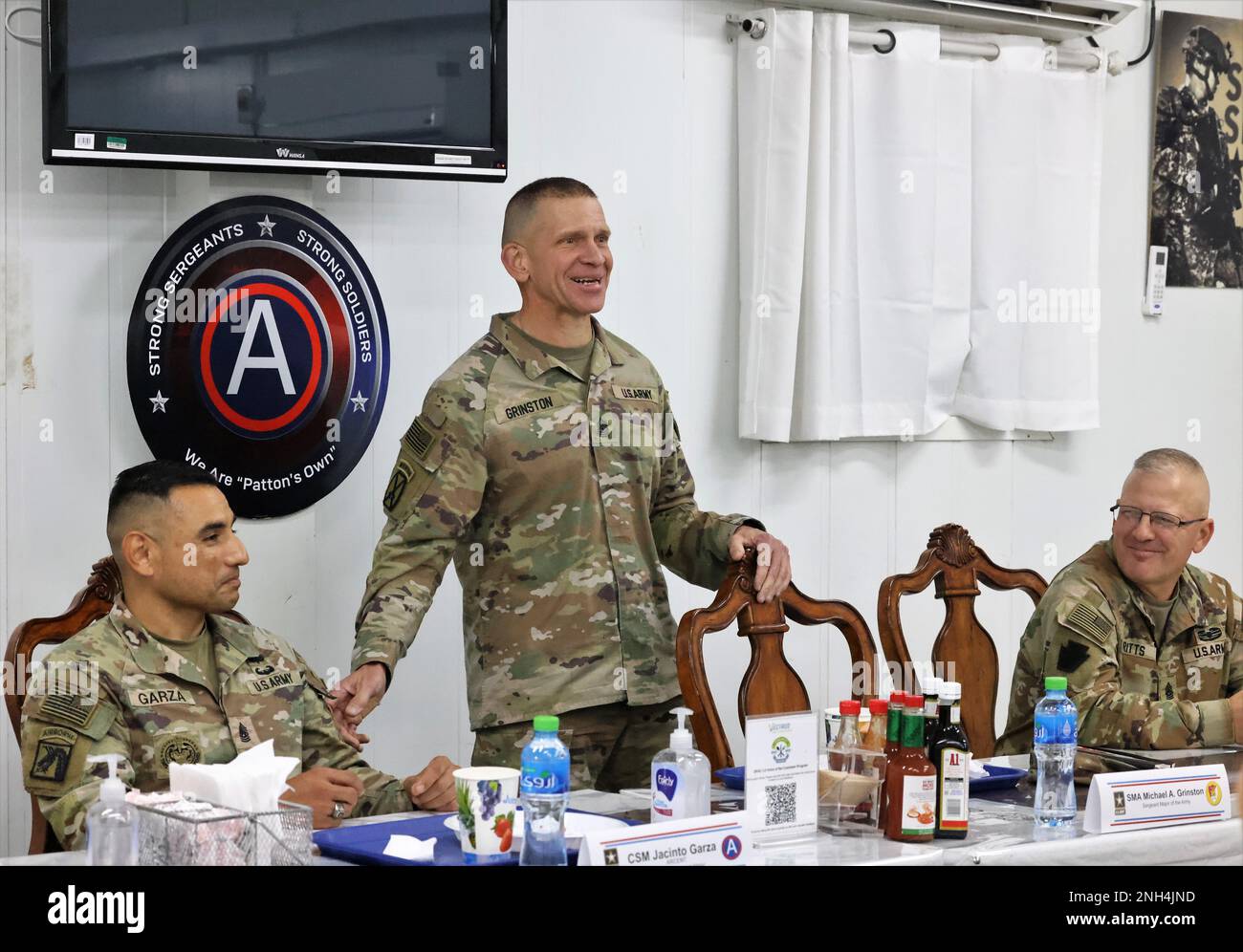 Sgt maj of the army michael a grinston awards coins to select