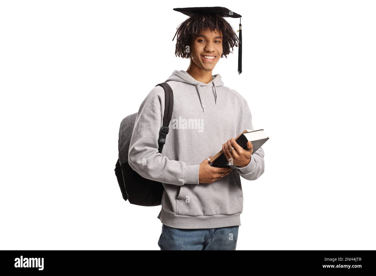 African american male student with a graduation hat holding books and ...