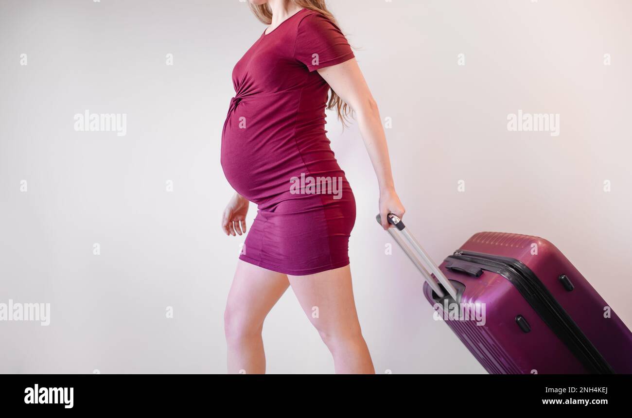 Pregnant woman with bag for maternity hospital Pregnant woman ready