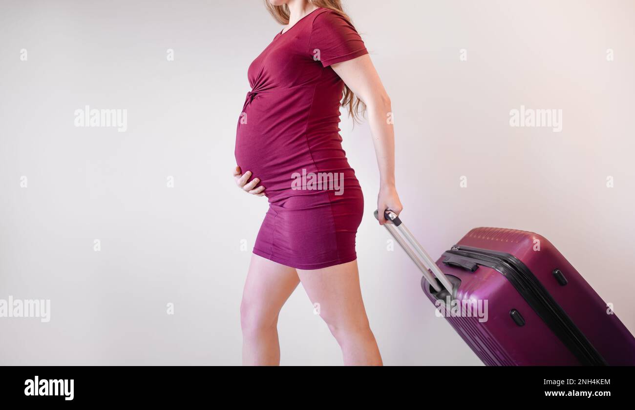 Pregnant woman with bag for maternity hospital Pregnant woman ready