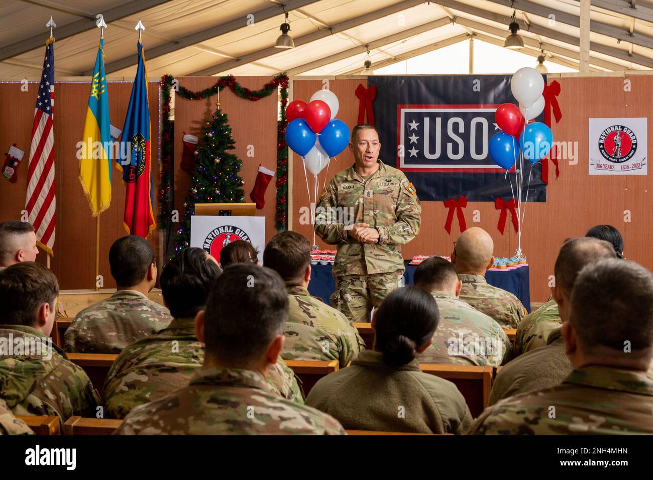 U.S. Army Command Sgt. Maj. Daniel Markle, command sergeant major of Task Force Orion, 27th Infantry Brigade Combat Team, New York Army National Guard, delivers a speech during a celebration of the 386th National Guard birthday in Grafenwohr, Germany, Dec. 13, 2022. The formation of the first militia regiments in North America on December 13, 1636 are recognized as the birth of the National Guard, and are celebrated by Guard units from the 54 U.S. states and territories serving domestically and deployed around the world. Stock Photo