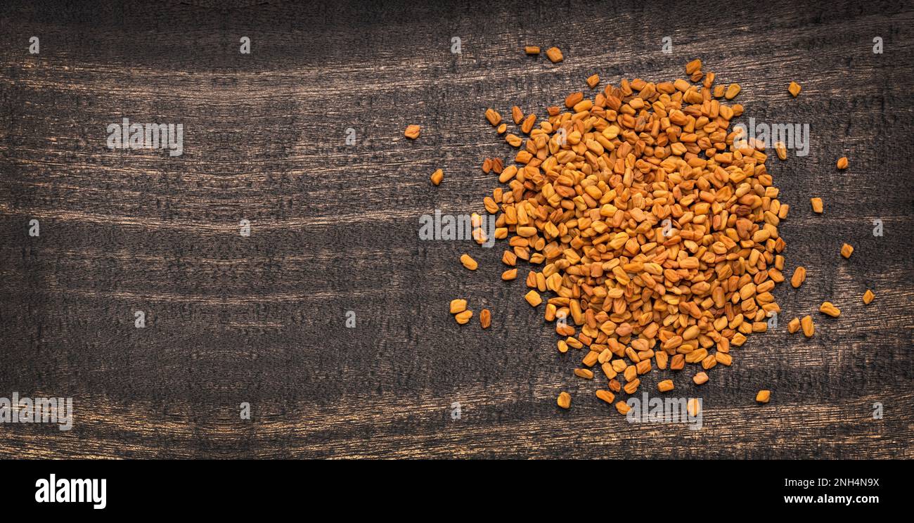 Organic dried fenugreek seeds - Trigonella foenum-graecum Stock Photo ...