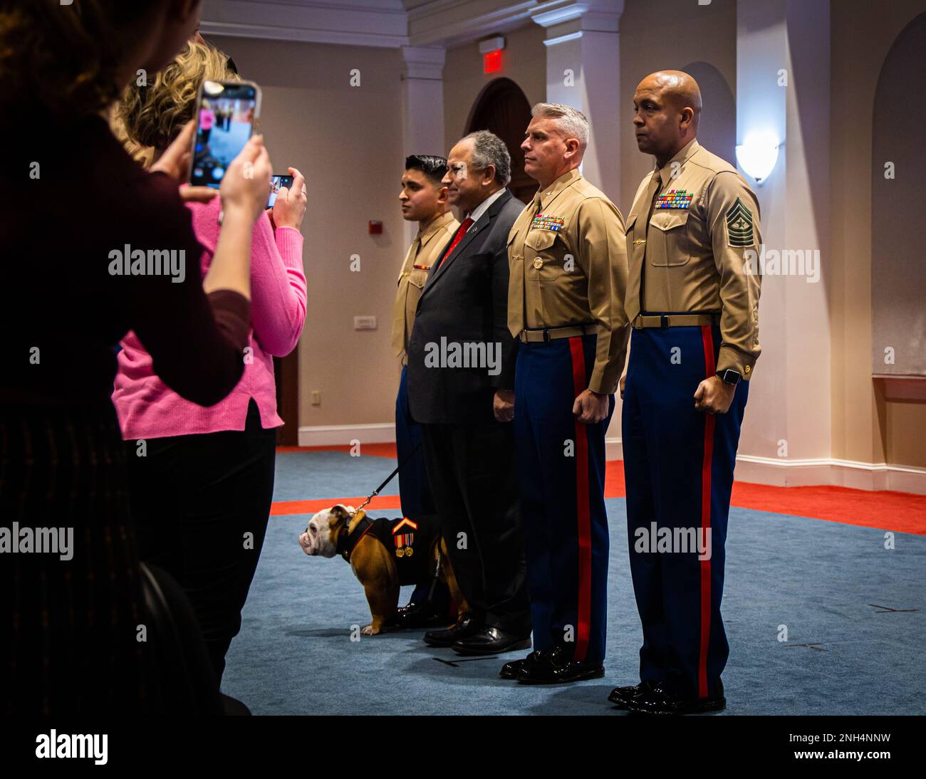 Marines stand at attention for honors during a promotion ceremony at Marine Barracks Washington, December 13th, 2022. Chesty XVI, mascot of the Marine Corps, was promoted to the rank of Private First Class by the Honorable Carlos Del Toro, Secretary of the Navy. Stock Photo