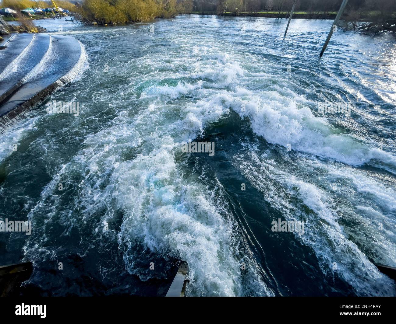 Fast flowing white water on the River Thames at Hambledon weir near Henley-on-Thames, Oxfordshire, England, UK Stock Photo