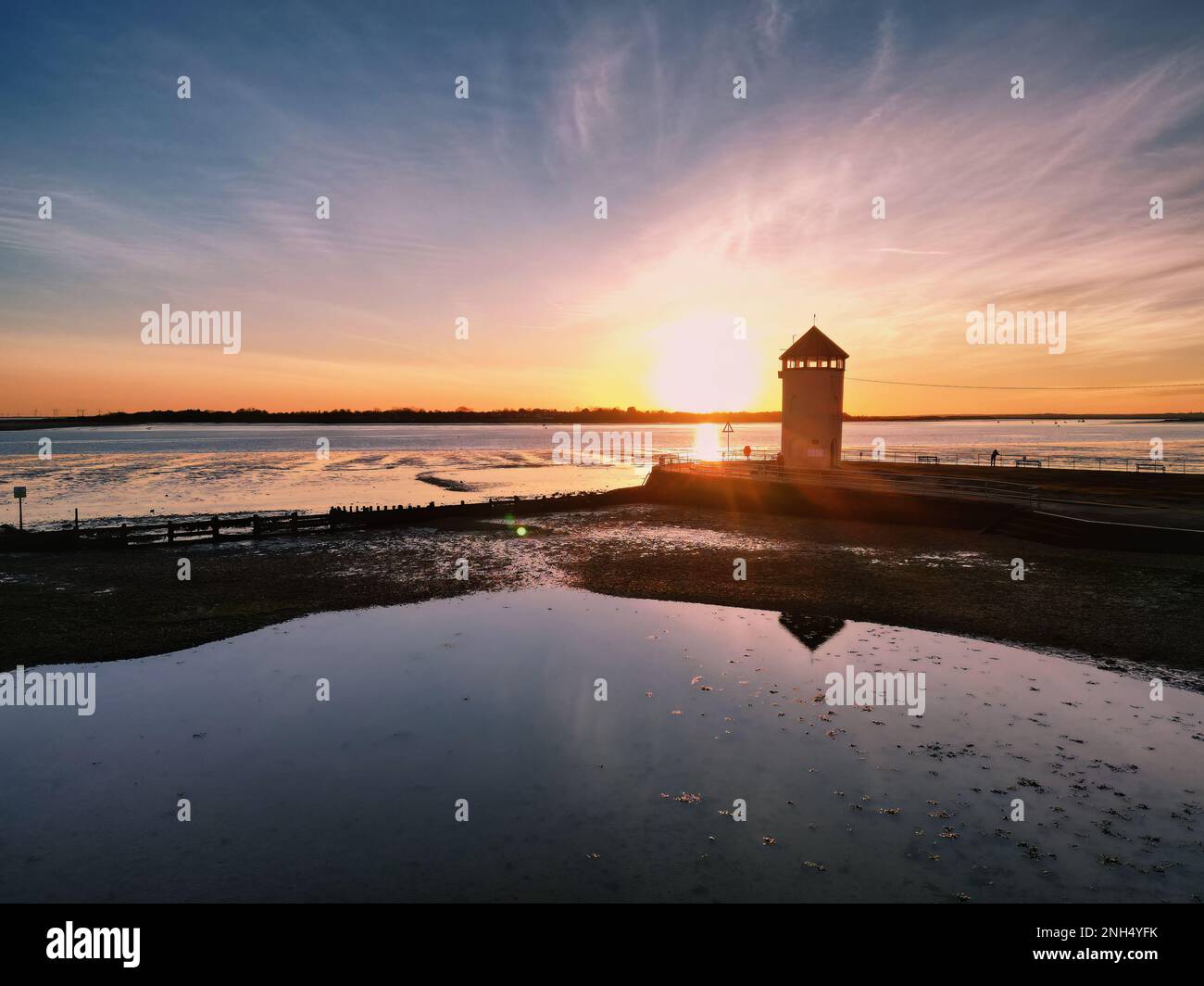 Sunset at the River Colne and Brightlingsea Beach in Essex, UK Stock Photo