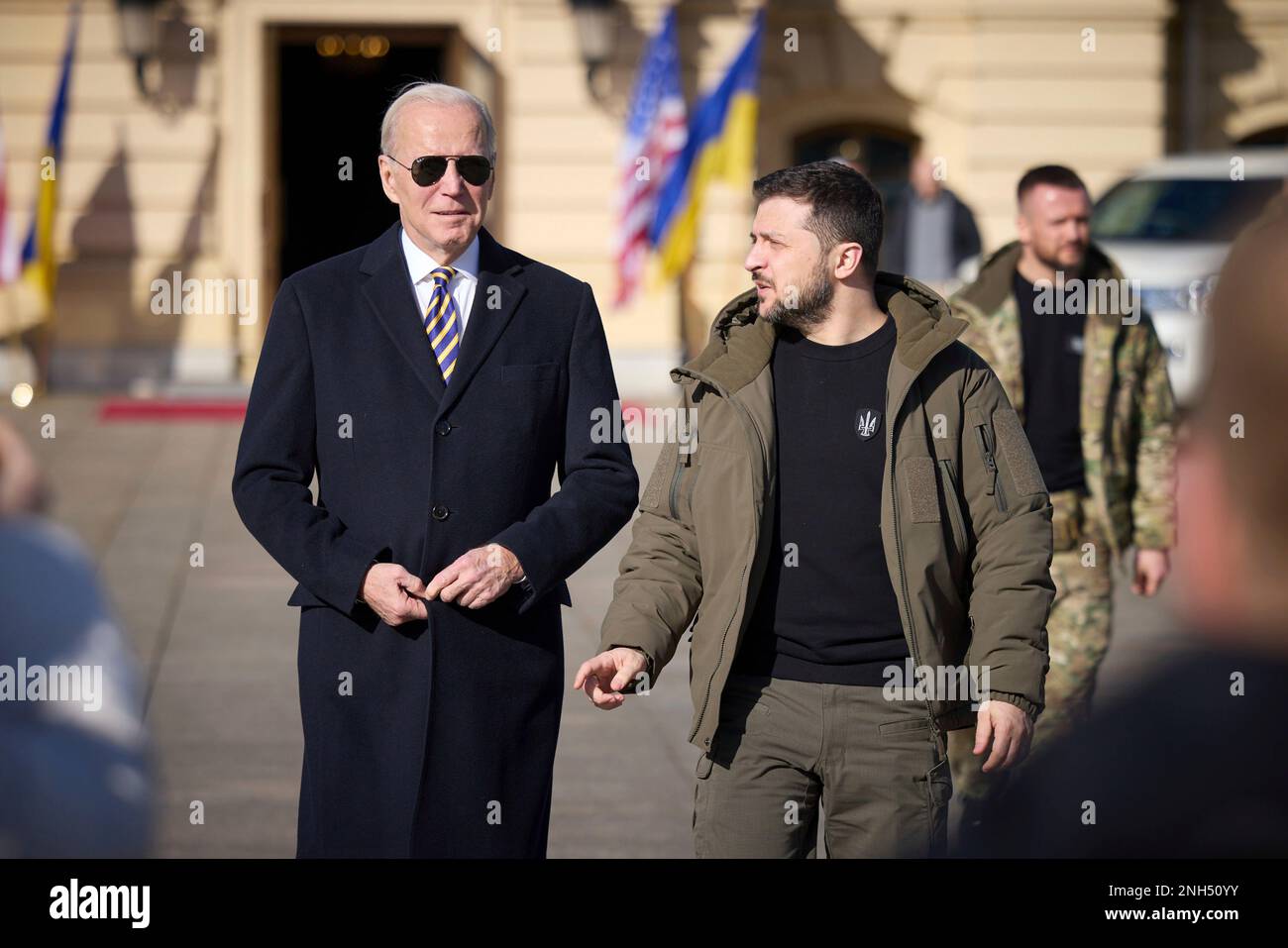 Kyiv, Ukraine. 20th Feb, 2023. U.S. President Joe Biden, left, and Ukrainian President Volodymyr Zelenskyy, right, walk together to the Walk of the Brave on Constitution Square, February 20, 2023 in Kyiv, Ukraine. Biden stopped in Kiev on an unannounced visit to renew American support for Ukraine. Credit: Adam Schultz/White House Photo/Alamy Live News Stock Photo