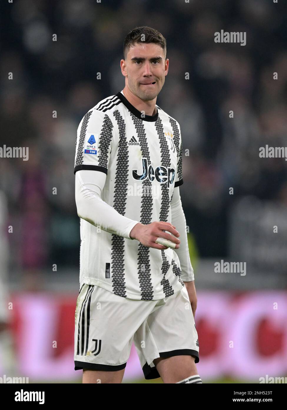 Dusan Vlahovic of Juventus and Christiano Biraghi of Acf Fiorentina during  the Italian serie A, football match between Juventus Fc and Acf Fiorentina  on 12 February 2023 at Allianz Stadium, Turin, Italy.