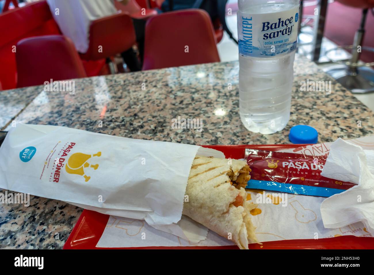 Paşa Döner, İstanbul  - classic wrap kebap doner with water served. chin doner restaurant Stock Photo