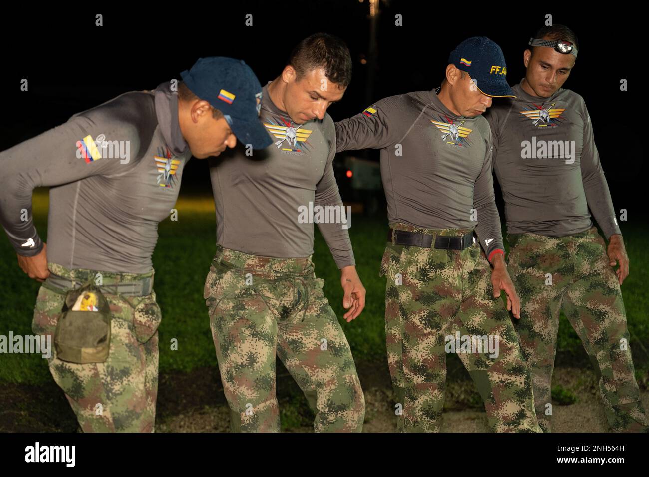 LA VENTA, Honduras Military Forces of Colombia warmup before a 12