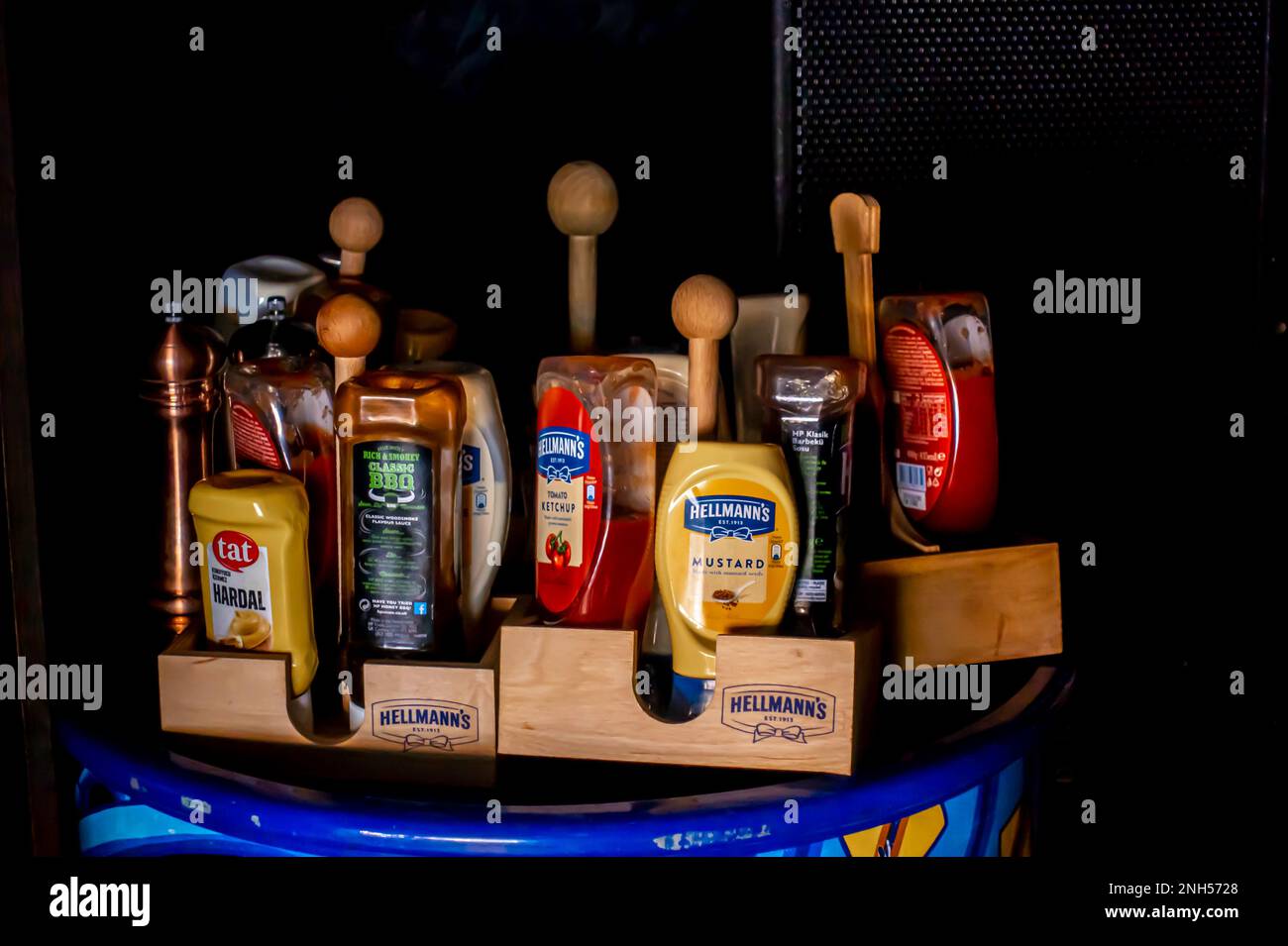 Ketchup, mustard, sauce on a tray. Condiments on a tray. Hellmann's branded tray for condiemnts, serving in restaurants Stock Photo
