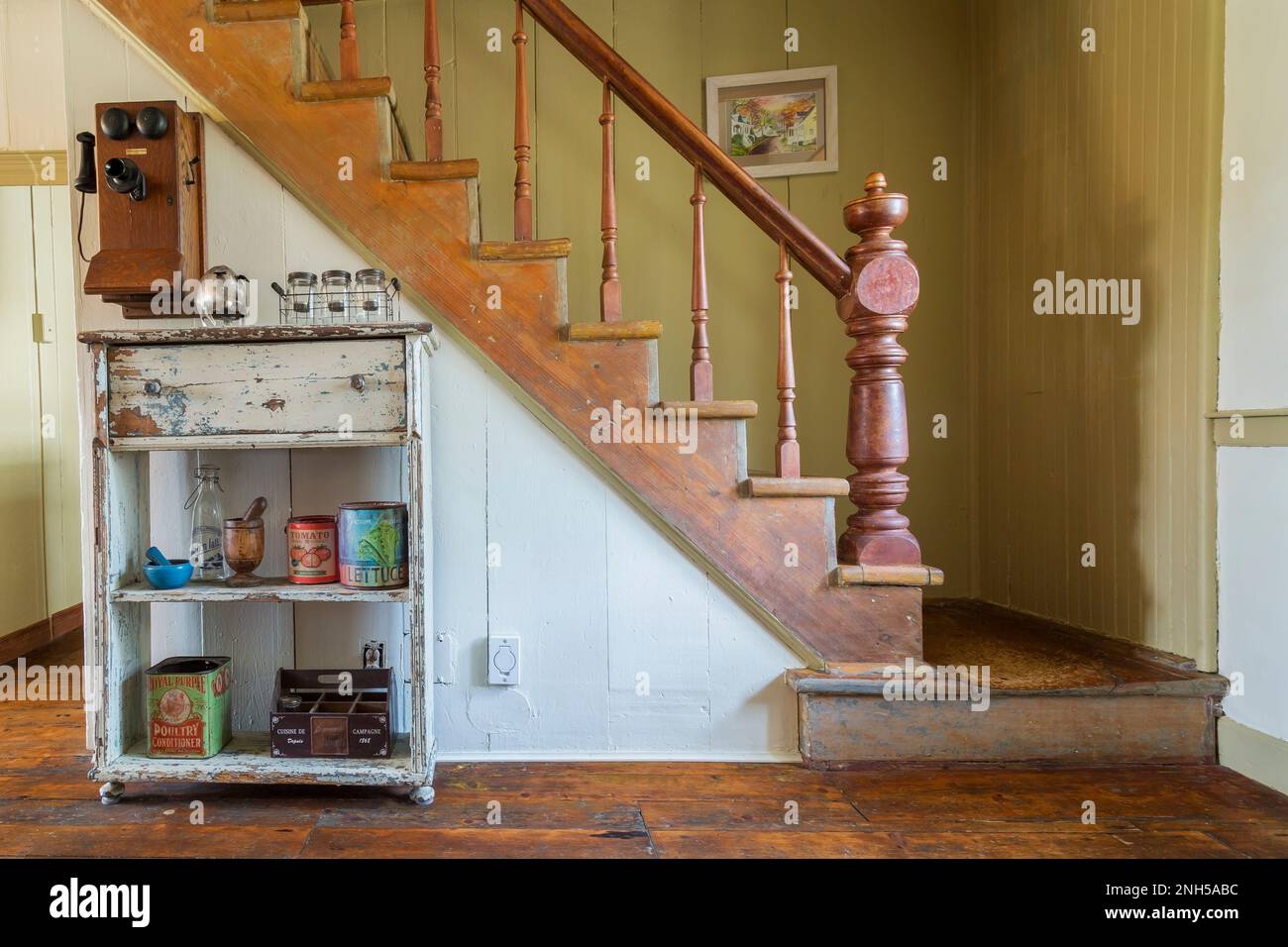 Distressed antique open shelf with vintage objects plus old